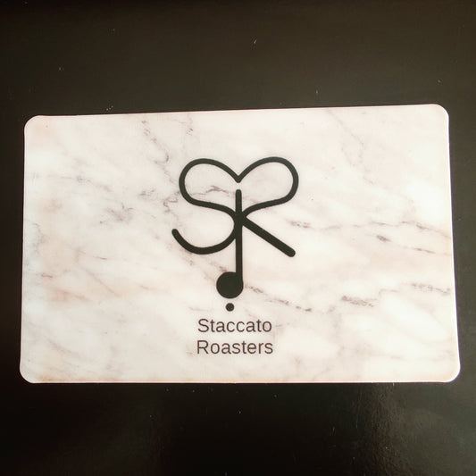Card with Staccato Roasters logo on a marble patterned background
