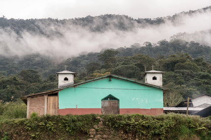 Mountain village in the Cajamarca coffee-growing region of Peru surrounded by cloud forest.