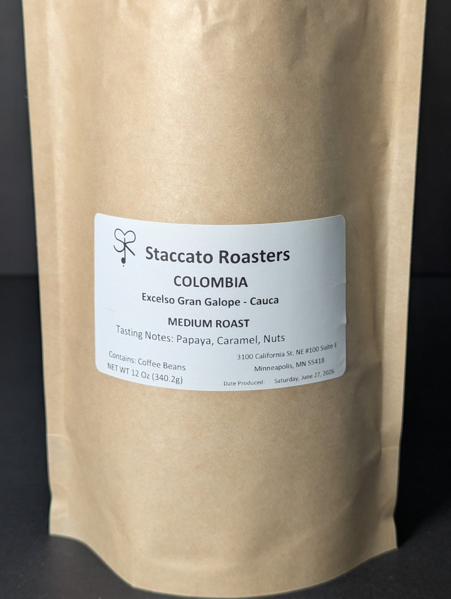 Staccato Roasters Gran Galope Colombia medium roast whole bean coffee, 12 oz bag with caramel, papaya, and nutty tasting notes.
