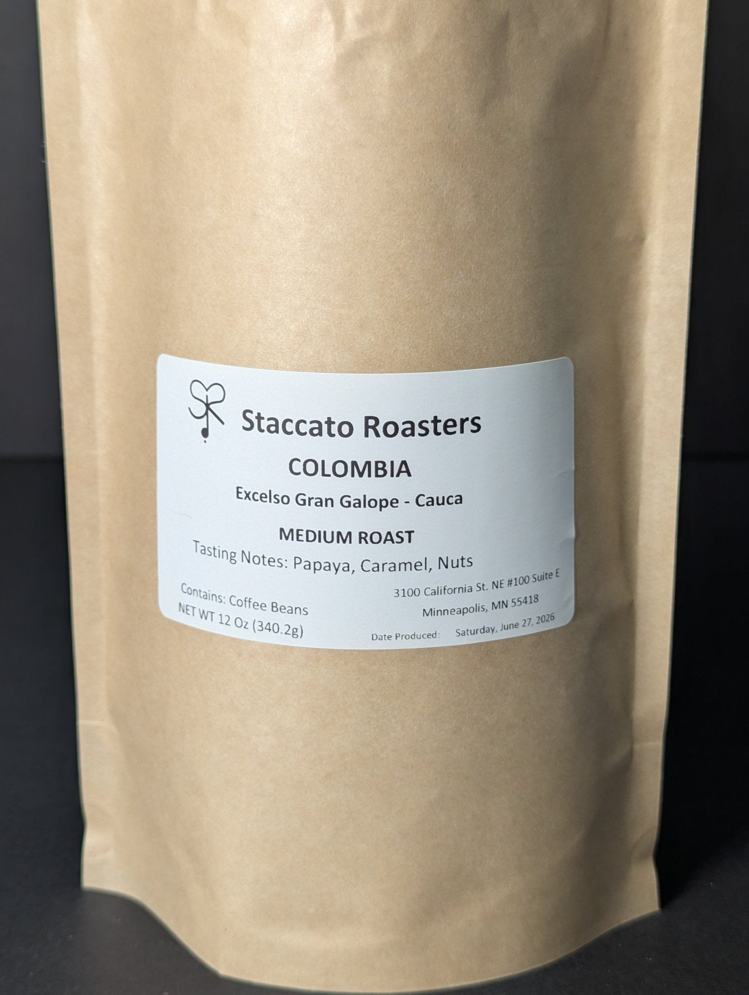 Staccato Roasters Gran Galope Colombia medium roast whole bean coffee, 12 oz bag with caramel, papaya, and nutty tasting notes.